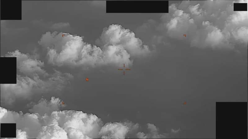 a, "Spherical UAP in clouds